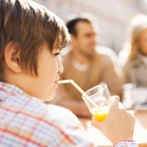 Boy Drinking with Straw